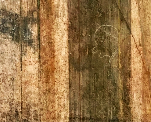 Graffito caricaturale scoperto nell'atrio della Villa dei Misteri a Pompei