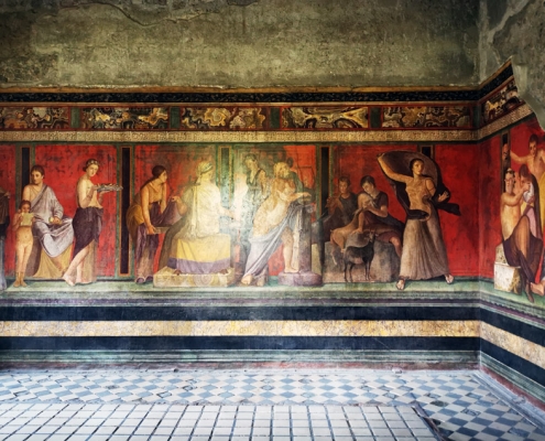 Salon of the Villa of the Mysteries in Pompeii with the different phases of the Dionysian initiation rite.