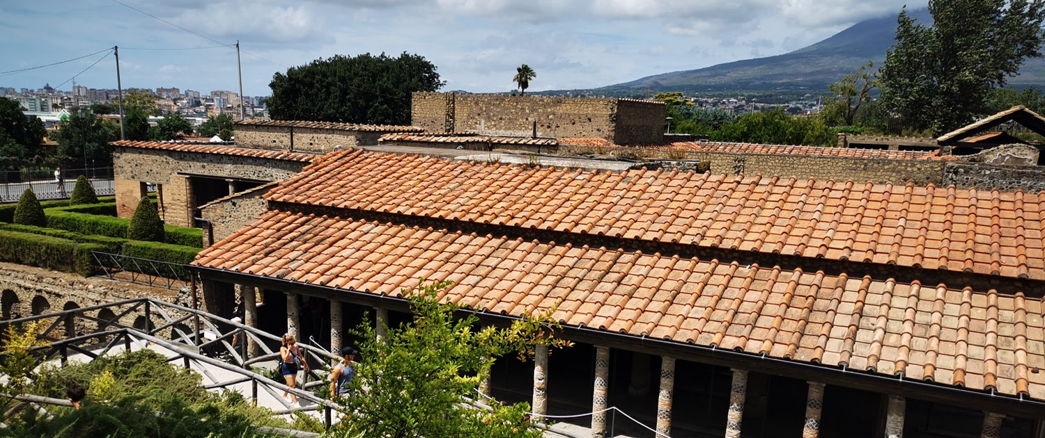 View of the Villa of the Mysteries of Pompeii with mt Vesuvius in the distance