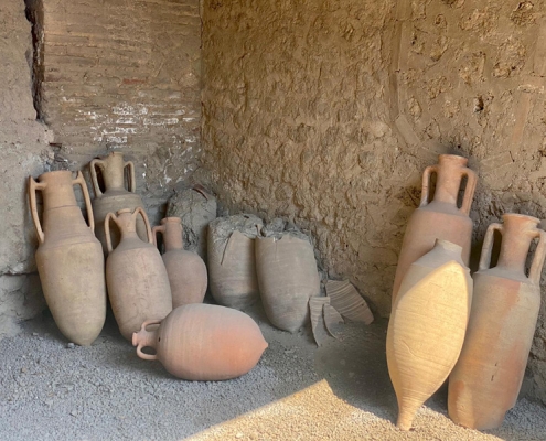 Pompeii guided tour: Some of the forty-three amphorae found in the House of the Menander in Pompeii